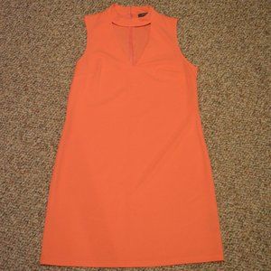 Medium coral/salmon sleeveless v-cutout neckline dress